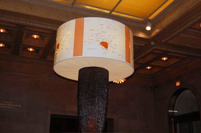 At the museum's Michigan Avenue entrance, a lamp crowned with a map of Africa stood above the main desk, in a spot where floral arrangements are typically housed.