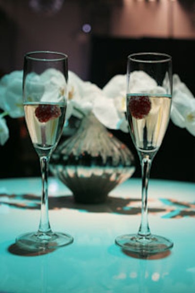 Drinks included flutes of champagne, each accented with a single raspberry.