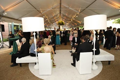 During cocktail hour, guests lounged on black and white furniture set up by Heffernan Morgan.