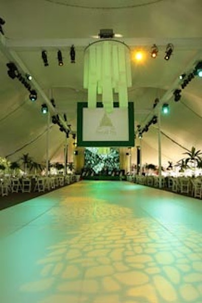 Inside the sprawling main tent, Frost's patterned lights allowed guests to follow a yellow brick road to their dinner seats.