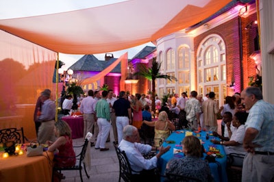 Hargrove hung orange chiffon drapery, while Atmosphere washed the facade in multi-colored lighting.