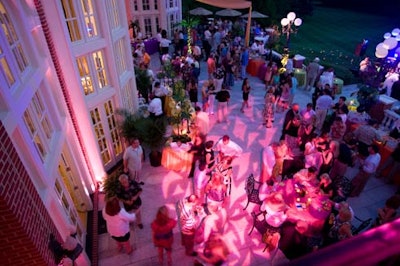 Pink gobo lights covered the 300-person crowd once the sun went down.