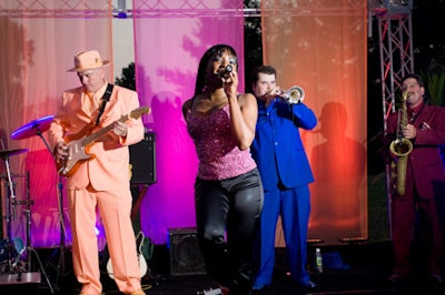 The eight-piece Millennium band took over the multi-colored stage and played Motown classics.