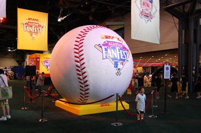 The 'world's largest' baseball stood near the entrance, marked up with autographs from all the players who made the trip to FanFest.