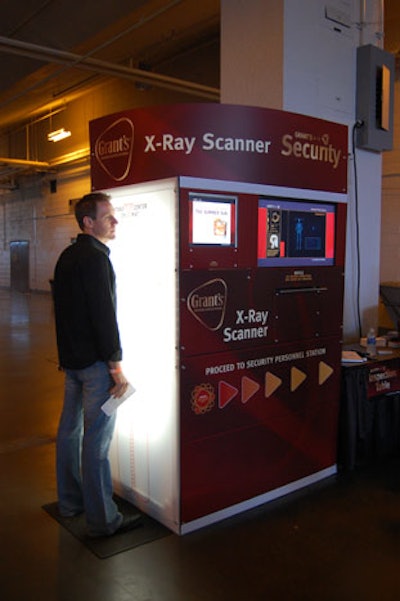 Attendees stopped by a security X-ray scanner sponsored by Grant's Blended Scotch Whisky for a chance to win prizes at the event.