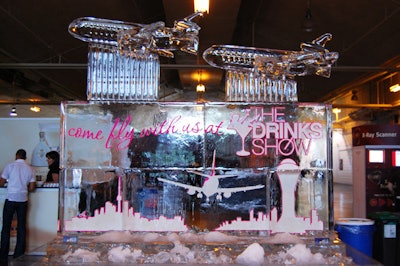 An ice sculpture featuring two airplanes, courtesy of Iceculture, showcased the theme of the event.