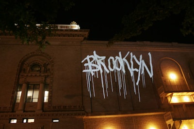 Graffiti Research Lab's L.A.S.E.R. Tag art project was showcased at a kickoff party for the Sundance Institute at the Brooklyn Academy of Music in June. The project, part of the festival's New Frontier program, allowed guests to tag the side of BAM's main building with digital graffiti.