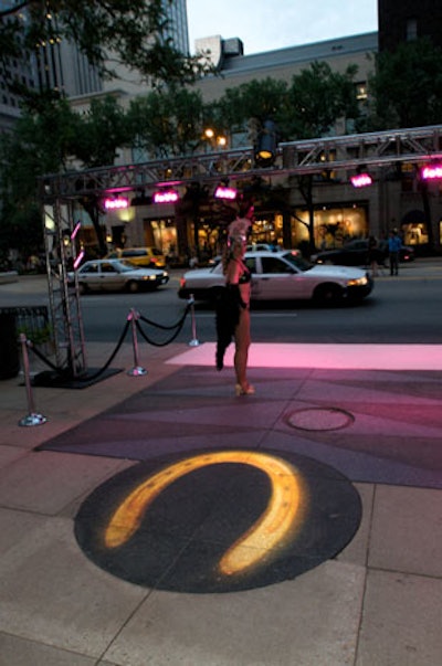 A giant horseshoe lit up the pavement outside Chicago Place.