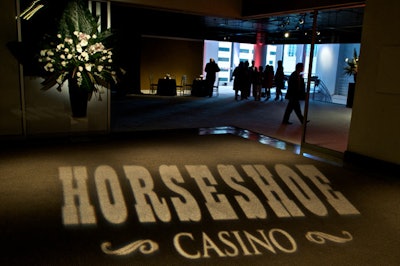 A Horseshoe gobo illuminated the entrance to the bi-level event space.