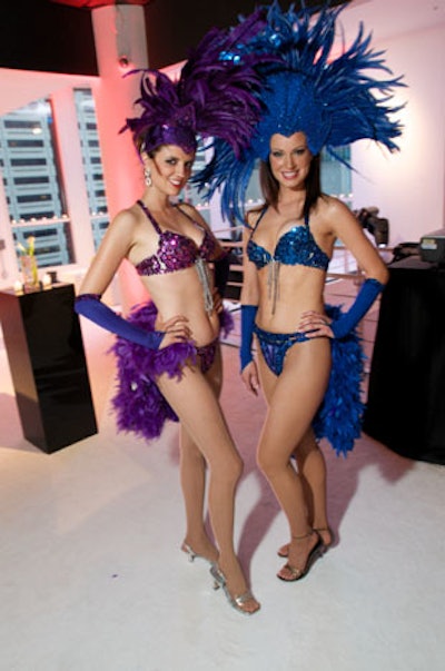 Vegas-style showgirls greeted guests and underscored the evening's casino theme.