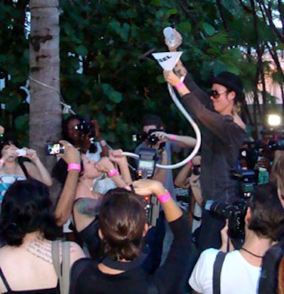 Partygoers enjoyed a favorite college pastime with Diesel-branded beer funnels.