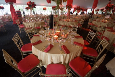 Approximately 1,000 guests sat down to dinner in gold Chiavari chairs, which underscored the dinner tent's decorative theme.