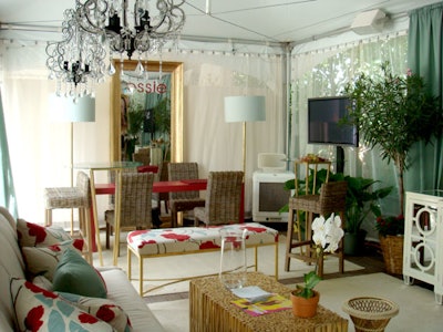 The Smashbox/Essie cabana featured elegant cream and sage draping, crystal chandeliers, luxurious love seats and benches.