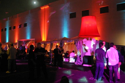 Colorful uplighting striped the venue's perimeter.