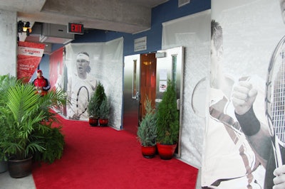 Black-and-white posters of players like Roger Federer and Rafael Nadal wrap the walls outside the entrance to the Rogers Cup Lounge.