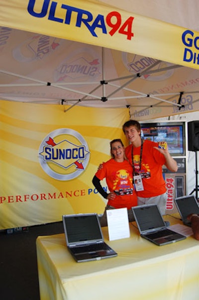 A casino-like game at the Sunoco booth offers spectators a chance to win a gas card valued at $1,000 as well as three prize packs including tickets to next year's tournament, an autographed photo of this year's winner, and a tennis racquet.