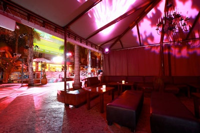Pink lighting decorated seating areas at the Cabana Club.