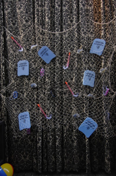 Fishing nets hung from the drapes inside the venue.