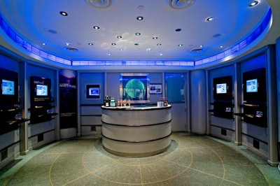 The Navy Log Room, with interactive computer stations set up around the space, can be transformed into a bar area for an event.