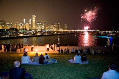 The Shedd Aquarium opened its north terrace and lawn so guests at the Blu event could get a closer view of the Venetian Night boat parade and fireworks.