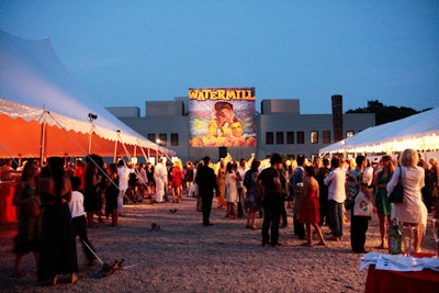 Indian artist Baba Anand created a Bollywood-style poster for the center's facade.