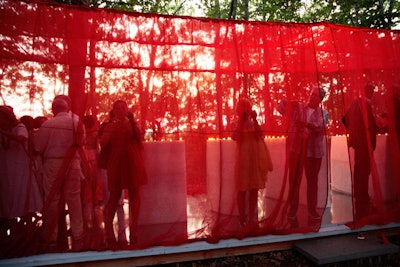 Indian installation artist Anita Dube created a red tent filled with burning candles and the word 'love' spelled out in large wax letters.