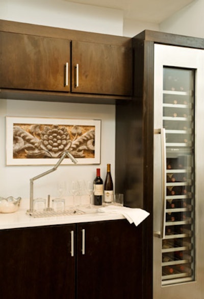 Diamond, which made the house's dark cherry cabinets, is a certified member of the Kitchen Cabinet Manufacturers Association's Environmental Stewardship Program.