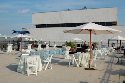 The hotel brought in extra tables with green-striped linens to accommodate the 200 guests.