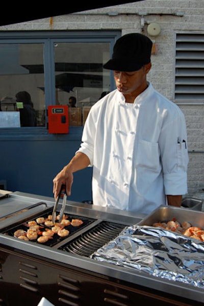 The hotel set up a shrimp grilling station for the event.