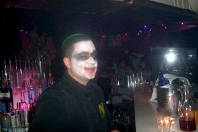Male staffers appeared curiously happy in their black, white, and red Joker face paint.