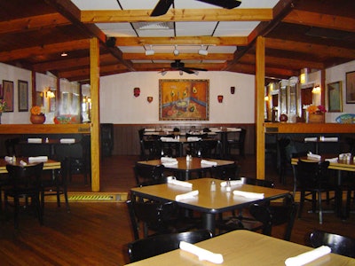 Don Juan's, an Edison Park staple, features a rustic Mexican atmosphere with exposed oak beams, traditional oil paintings, and clay pots throughout the space, which can accommodate 140 guests.