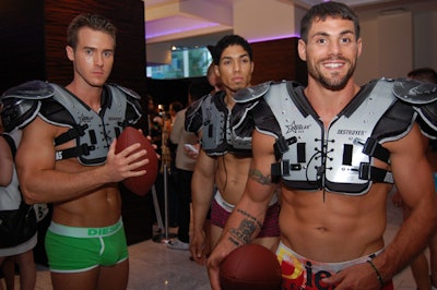 Men modeling shoulder pads and the Diesel collection greeted guests near the red carpet.