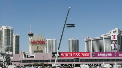 Twenty-two people can sit around the table, which is suspended 180 feet into the air.