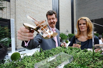 Most guests, like Simon Van Kempen and Alex McCord of Real Housewives, weren't shy about touching and playing with the various products on display.