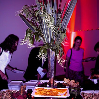 J. Gordon Design put a tall centerpiece on a buffet table at The Catering Company and Metropolitan Pavilion's special event showcase.