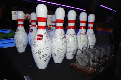 Bowling pins signed on the spot by Cubs players sold for $50.