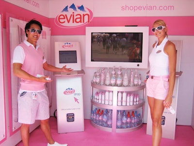 Evian's tent embraced all things pink, with preppy models on hand to spritz fans with Evian Mineral Water Spray.
