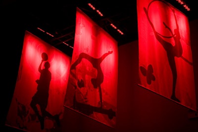 Banners highlighting different Olympic events hang from the center's ceiling.