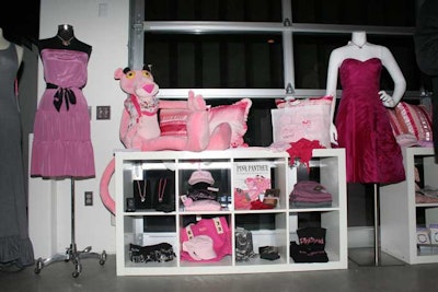 Pinkitude clothing and accessories decked shelves and mannequins.