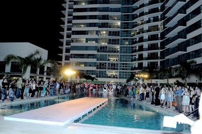Unlike a traditional fashion show with a photographers' pit at the end of the runway, Unzipped had them surrounding the pool's edge.