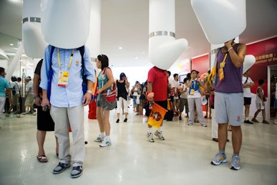 Cell phone stations hanging from the ceiling allowed guests the chance to sample music, movies, and television series.