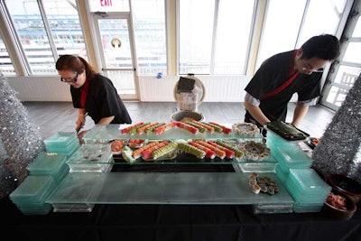 In addition to passed hors d'oeuvres, Foremost Glatt Kosher Caterers provided a sushi and sashimi bar manned by two chefs.