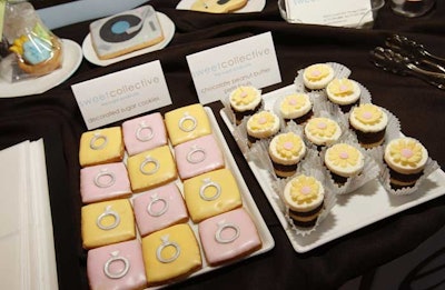 A dessert buffet from Sweet Collective featured decorated cookies and chocolate-peanut butter petit fours.