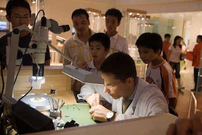 Omega watchmakers gave demonstrations to visitors, showing them the gears inside the timepieces.