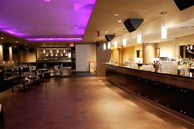 Color-changing LED ceiling lights brighten the main space at Shadow Room.
