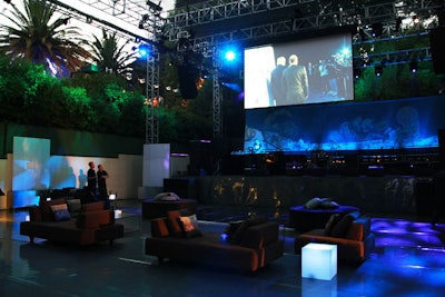 Blue lighting decorated the dance floor and the stage set up on the tennis court.