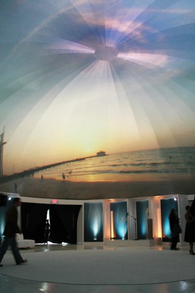The interior of a dome structure featured video imagery from Dubai.