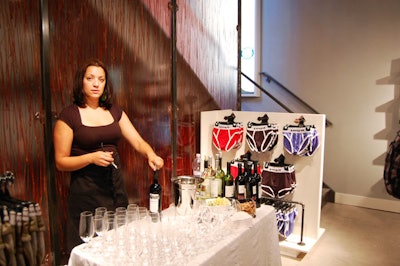 A small wine bar sat amid the underwear displays on the lower level of the shop.