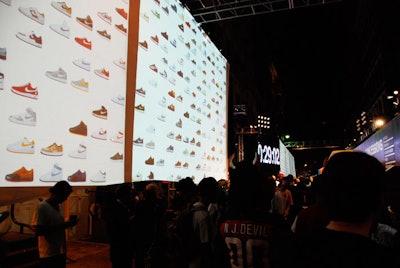 Nike played its most popular TV commercials on giant projection screens adjacent to the storefront.