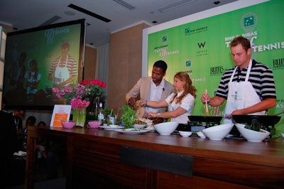 Host A.J. Calloway, chef Ingrid Hoffman, and Andy Roddick made tomatillo shrimp with coconut rice and mango salsa during the night's cooking demonstration.
